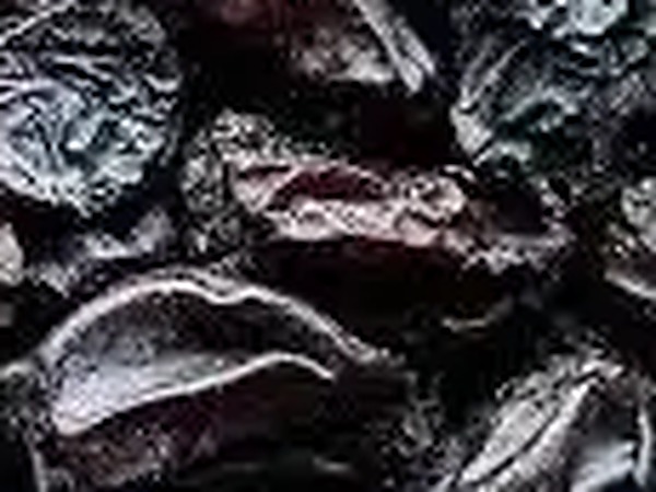 Close-up of black raisins